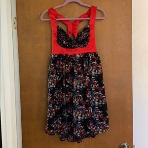 Empire waist mini dress with racer back.